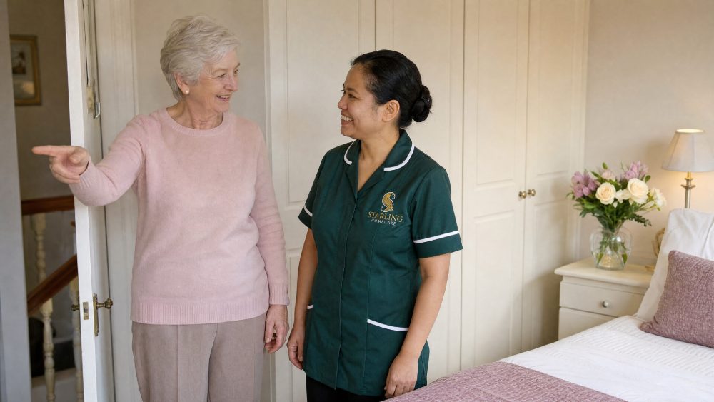 Preparing for a Live-In Carer in Harpenden: A Family Guide Older woman showing a carer in a bottle green uniform her room, preparing for a live-in carer in Harpenden