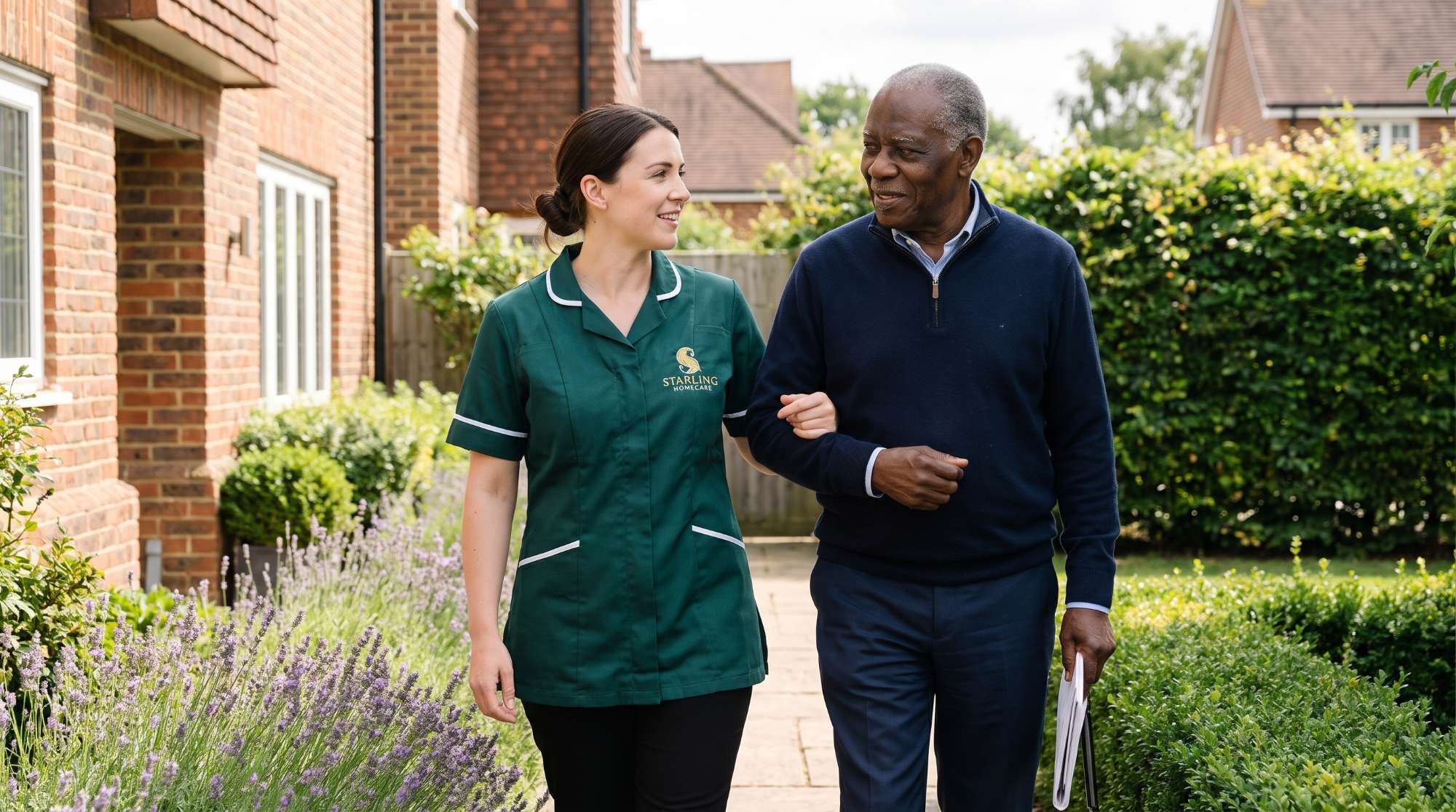 A Starling Homecare carer bringing a cup of tea to a woman at her kitchen table at home A Starling Homecare carer bringing a cup of tea to a woman at her kitchen table at home
